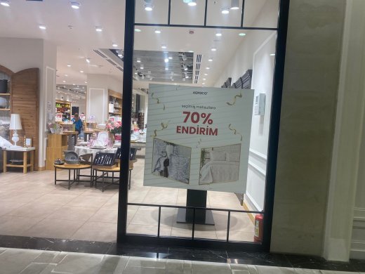 "Karaca" mağazalar şəbəkəsini kim himayə edir?